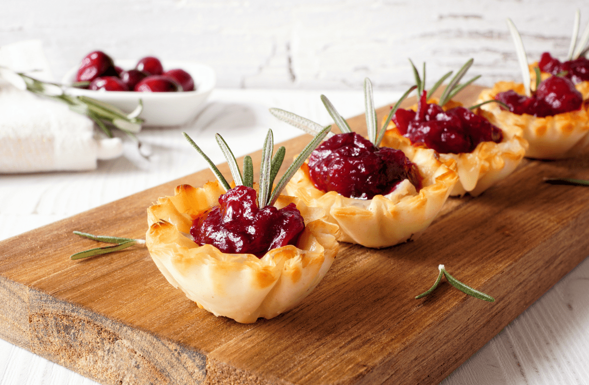 https://murrietaswell.com/wp-content/uploads/2025/11/Cranberry-Brie-Phyllo-Cups-with-Fresh-Thyme.png
